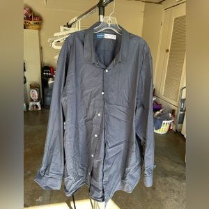 Men’s button down shirt. Blue with small dots. Hardly worn and is like new.